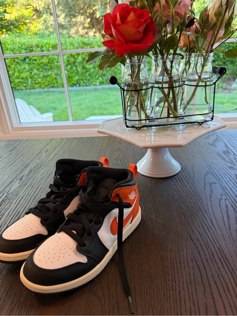 Nike Jordan AJ 1 Mid Kids Black White and Orange High-Top Sneakers